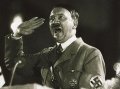 На улицах нескольких областных центров появились открытки с изображением Адольфа Гитлера и надписью "Я также истреблял украинцев. Поставьте и мне памя